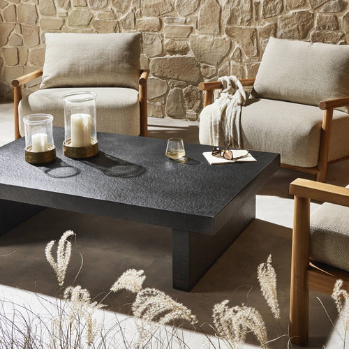 Huesca Outdoor Coffee Table Distressed Graphite Concrete Staged View in Outdoor Setting Four Hands