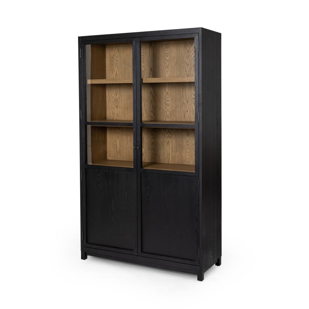 Millie Panel and Glass Door Cabinet Drifted Matte Black Angled View Four Hands