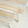 Ibiza Reclaimed Wood Dining Bench close up view with table