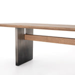 Four Hands Brennan Dining Table view of part of top 1 of the steel legs and intersecting beam