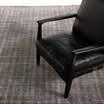 Amaud 6 x 9' Rug Charcoal Staged View with Accent Chair 106505-014