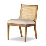 Antonia Cane Armless Dining Chair Toasted Parawood Angled View Four Hands
