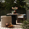 Four Hands Basil Outdoor Dining Table Aged Grey Staged View