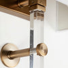 Mercana Cantabria Wall Sconce brass and clear base