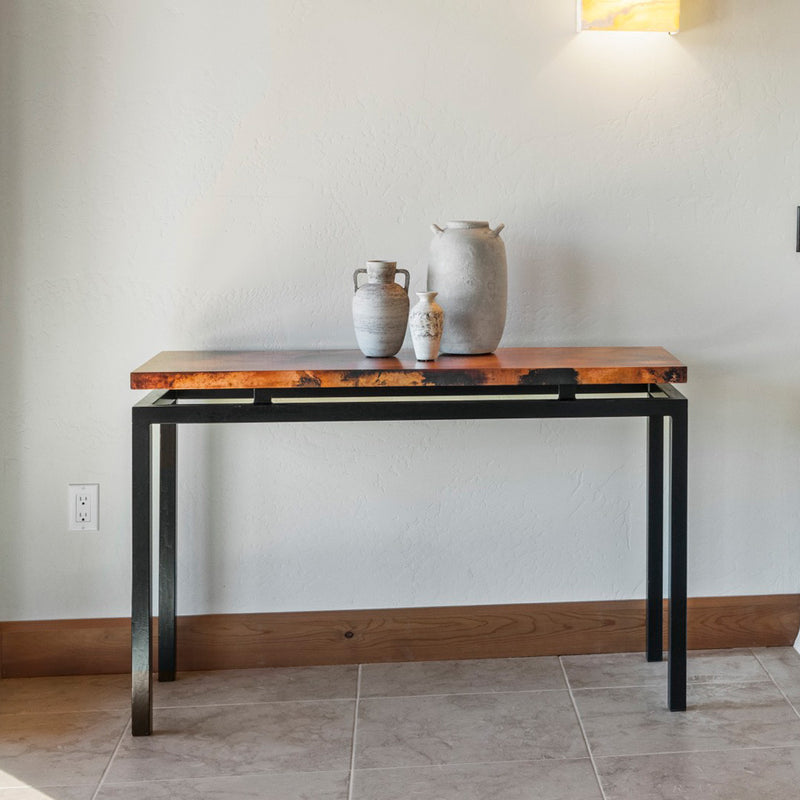 Diorite Copper Console Table Natural Patine Staged View