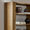 Four Hands Fisher Bookcase staged viw 