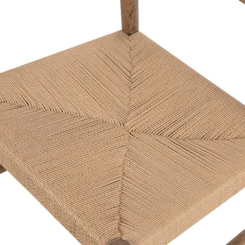 Glenmore Woven Dining Chair Smoked Oak Seat Angled Detail Four Hands