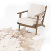 Harland Modern Cowhide Rug Warm Brown Staged View under Accent Chair SMAT-001A