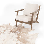 Harland Modern Cowhide Rug Warm Brown Staged View under Accent Chair SMAT-001A