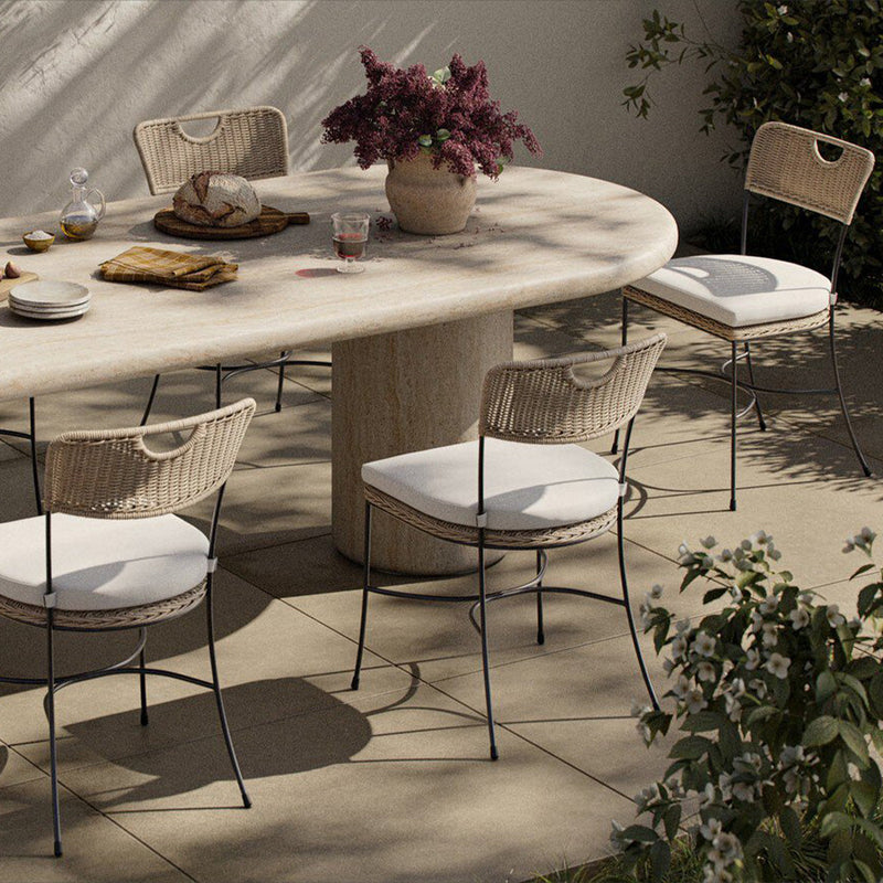 Four Hands Honor Outdoor Dining Chair staged outdoor setting 