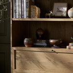 Four Hands Millie Bookcase staged interior shelf view 