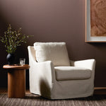 Monette Slipcover Swivel Chair Brussels Natural Staged View Four Hands
