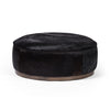 Sinclair Large Round Ottoman Black Hair on Hide Angled View 106119-014