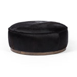 Four Hands Sinclair Large Round Ottoman Black Hair on Hide Side View