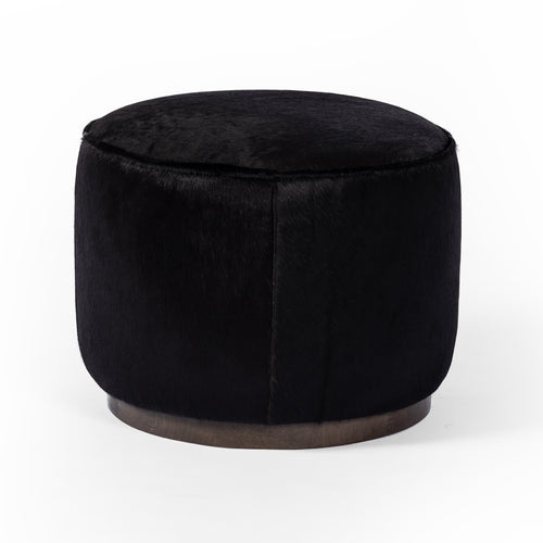 Sinclair Round Ottoman Black Hair on Hide Side View Four Hands