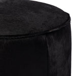 Four Hands Sinclair Round Ottoman Black Hair on Hide Rounded Edge Detail
