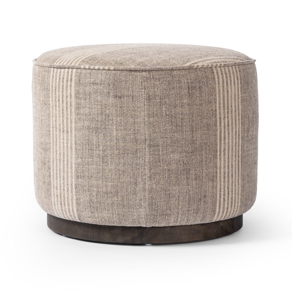 Four Hands Sinclair Round Ottoman angled view 