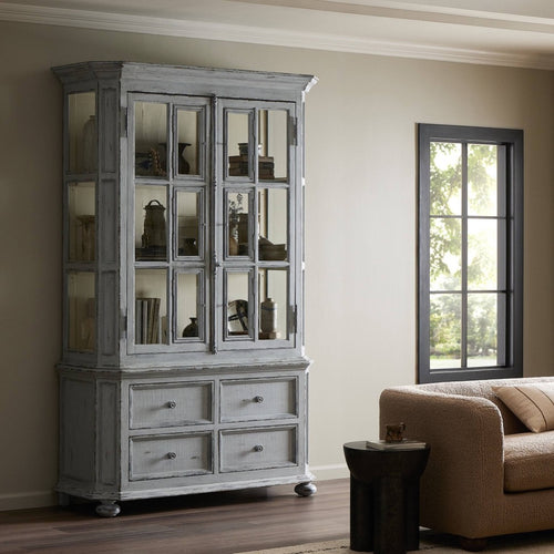 The "You Will Need a Lot Of Hinges" Cabinet Distressed Grey Blue Staged View Four Hands
