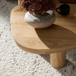 Four Hands Zion Nesting Coffee Table staged view of corner table 