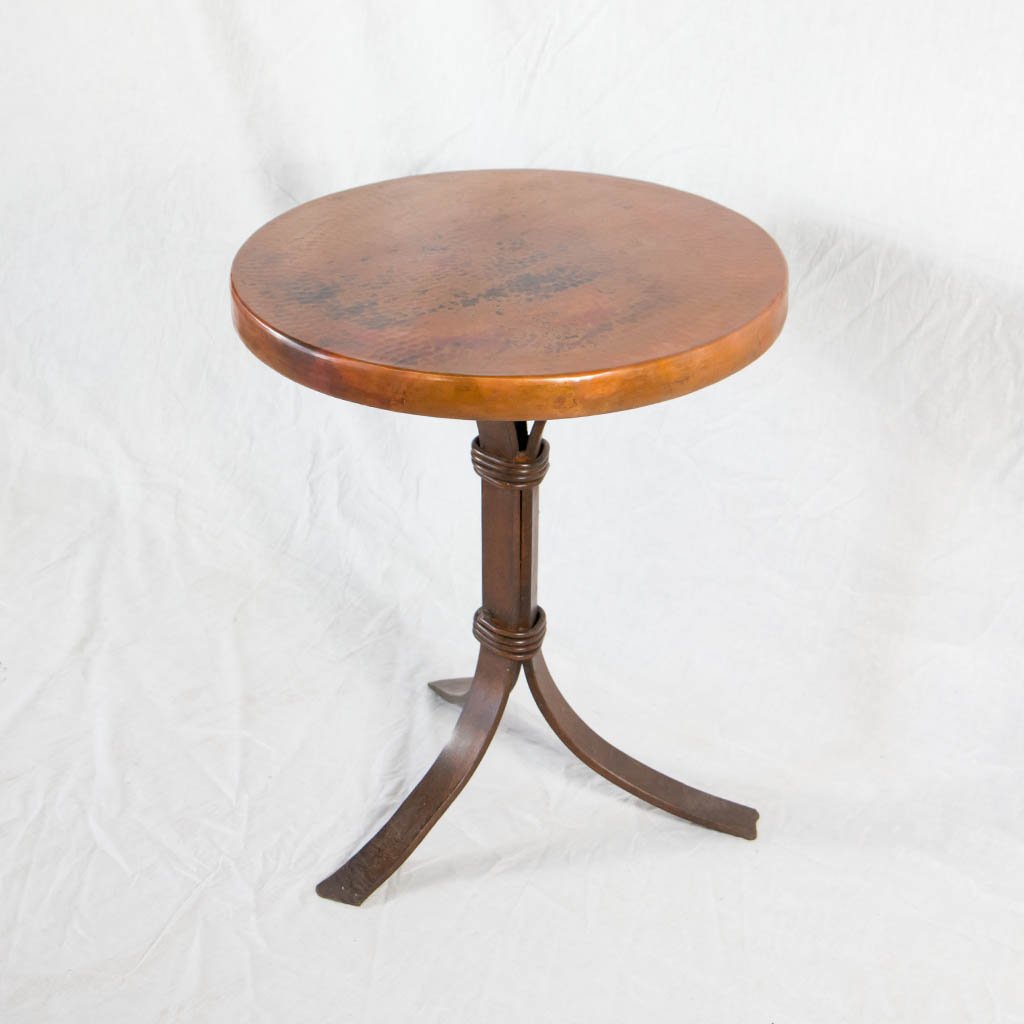hammered copper top and iron base cocktail table