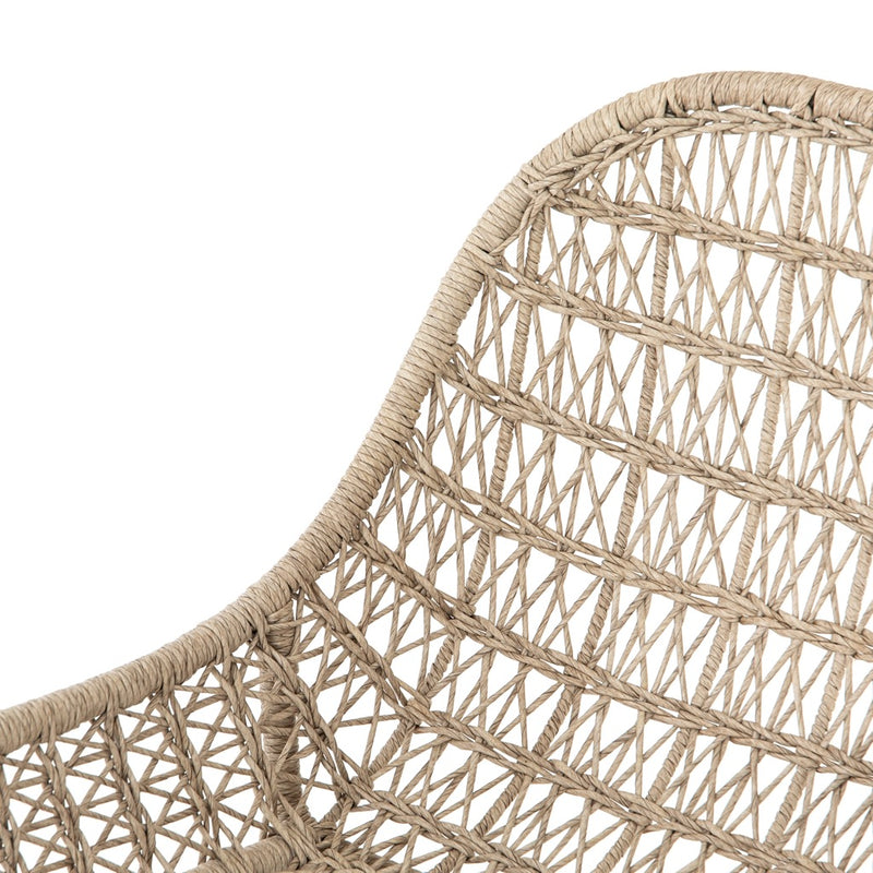 Bandera Outdoor Woven Dining Chair left side view of wicker back rest