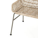 Bandera Outdoor Woven Dining Chair left side view of wicker seat and iron base