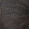 Bronx Dining Table close up view of dark wood on bottom side