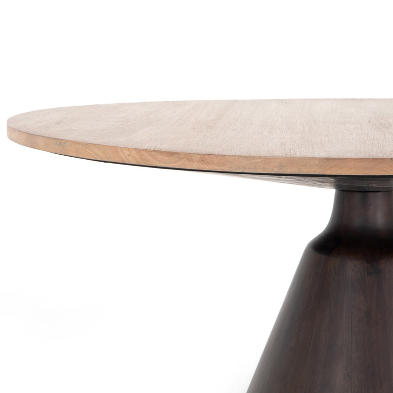 Four Hands Bronx Dining Table close up view of top and pedestal base