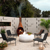 Bruno Outdoor Chair styled view in outdoor setting
