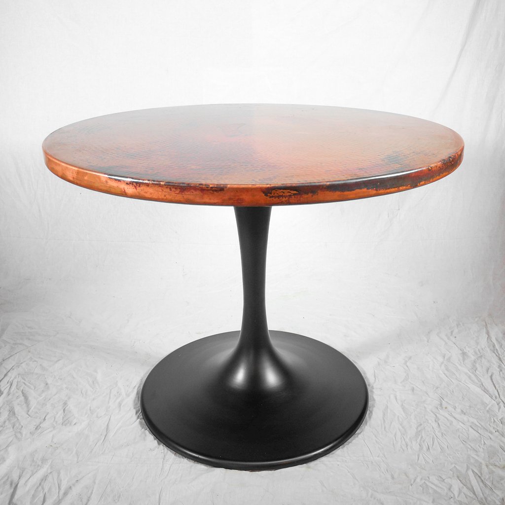 round copper dining table with tulip style base