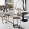 Creighton End Table Brass pictured with several other end tables by Four Hands furniture
