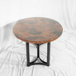 Eolus Oval Copper Dining Table - Black & Natural Copper - End View