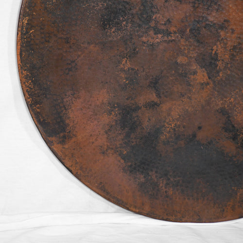 Detail view of Round Copper Tabletop with Hammered Texture & Dark Natural Finish