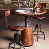 Industrial Modern Adjustable Height Stool shown with a table