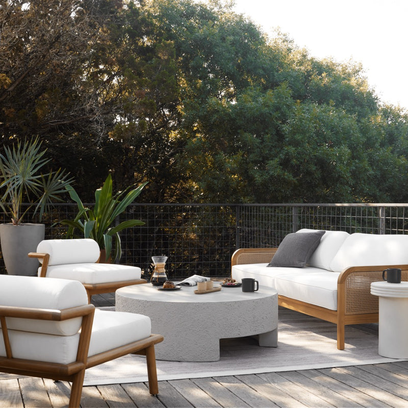 Four Hands Kember Outdoor Coffee Table Staged View in Outdoor Setting