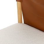 Lulu Armless Dining Chair saddle leather and faux shearling seat