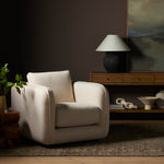 Malakai Swivel Chair Capri Oatmeal Staged View Four Hands