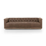 tufted brown leather sofa