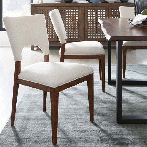 Mitchel Linen Dining Chair - Classic Home shown at a table