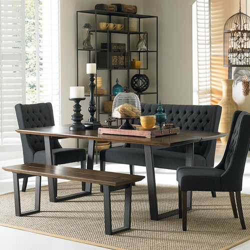 Mozambique dining table shown with chairs and bench