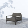 Sherwood Outdoor Chair, Bronze - Charcoal view with leaf reflection on outdoor wall