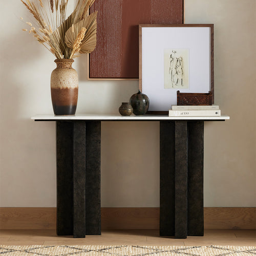Terrell Console Table Staged Image with decor pieces pictures on the marble top