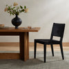 Villa Dining Chair Black Hair on Hide Staged View in Dining Room Setting Four Hands