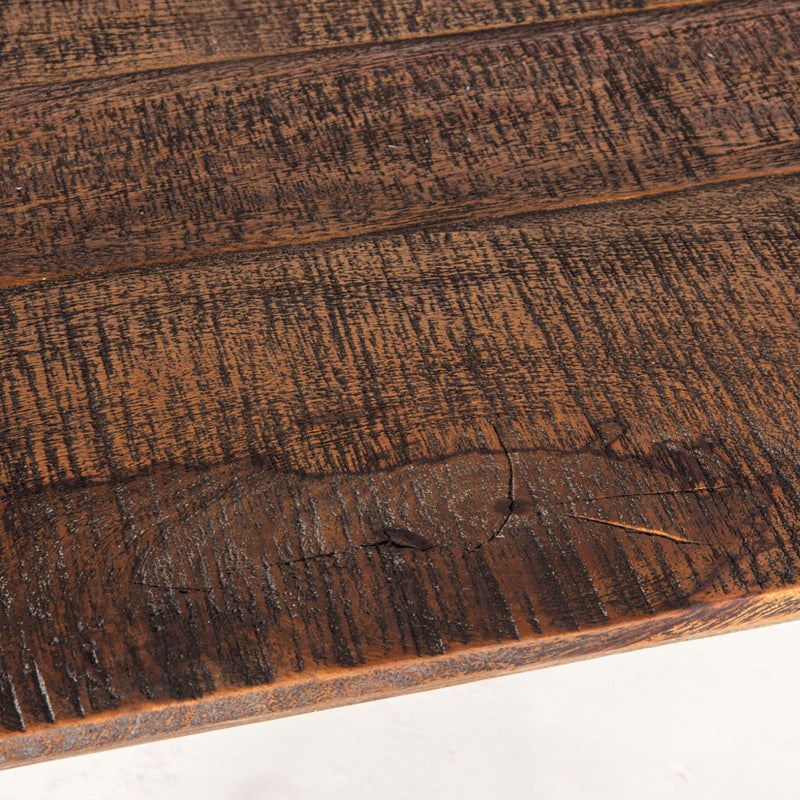Home Trends and Design Teak Dining Table close up of wood