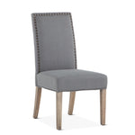 Home Trends and Design Gray Upholstered Dining Chair angled view